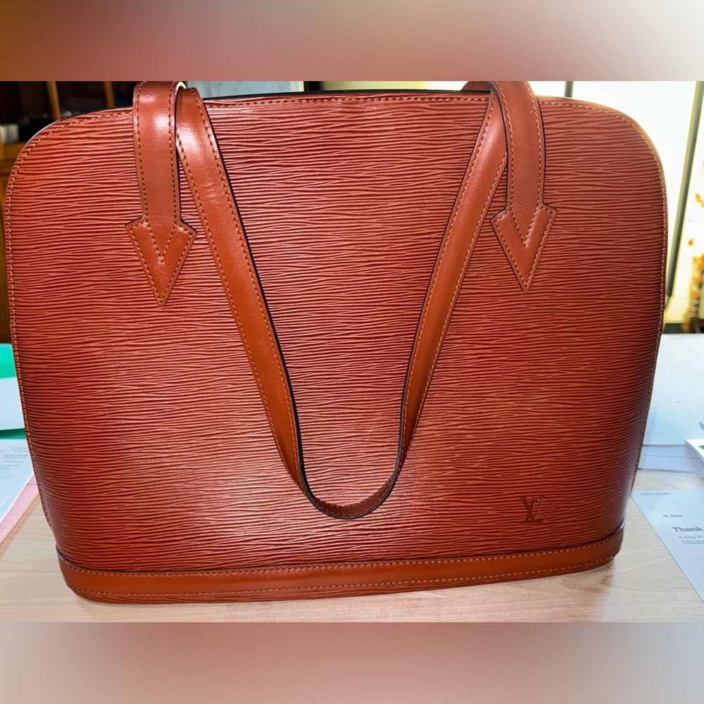 Louis Vuitton Lussac Epi Leather. COA provided. VI0916. Price is firm.